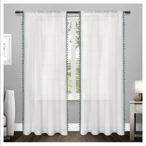 Sheer White Curtains with blue tassels